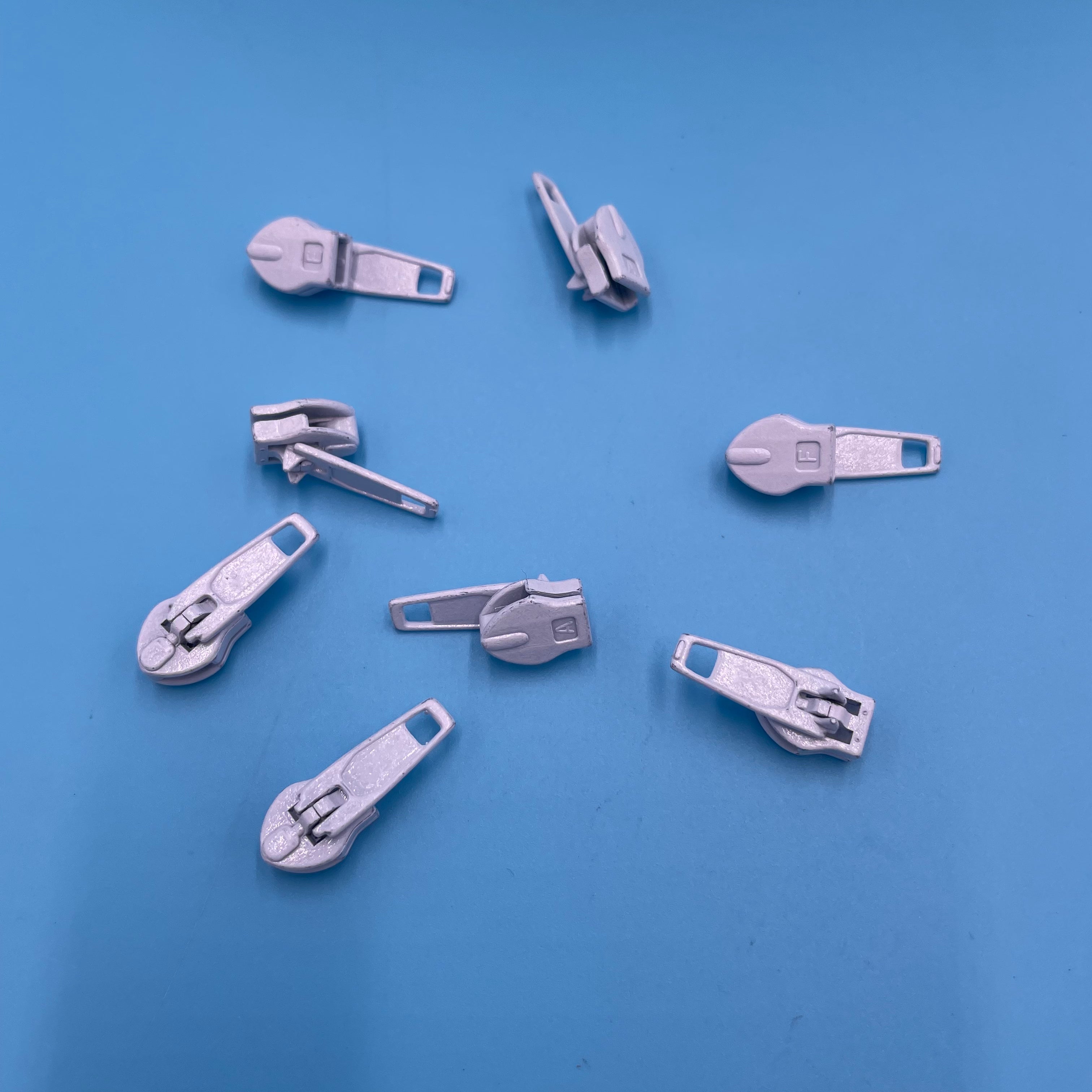 4.5 White Zipper Sliders