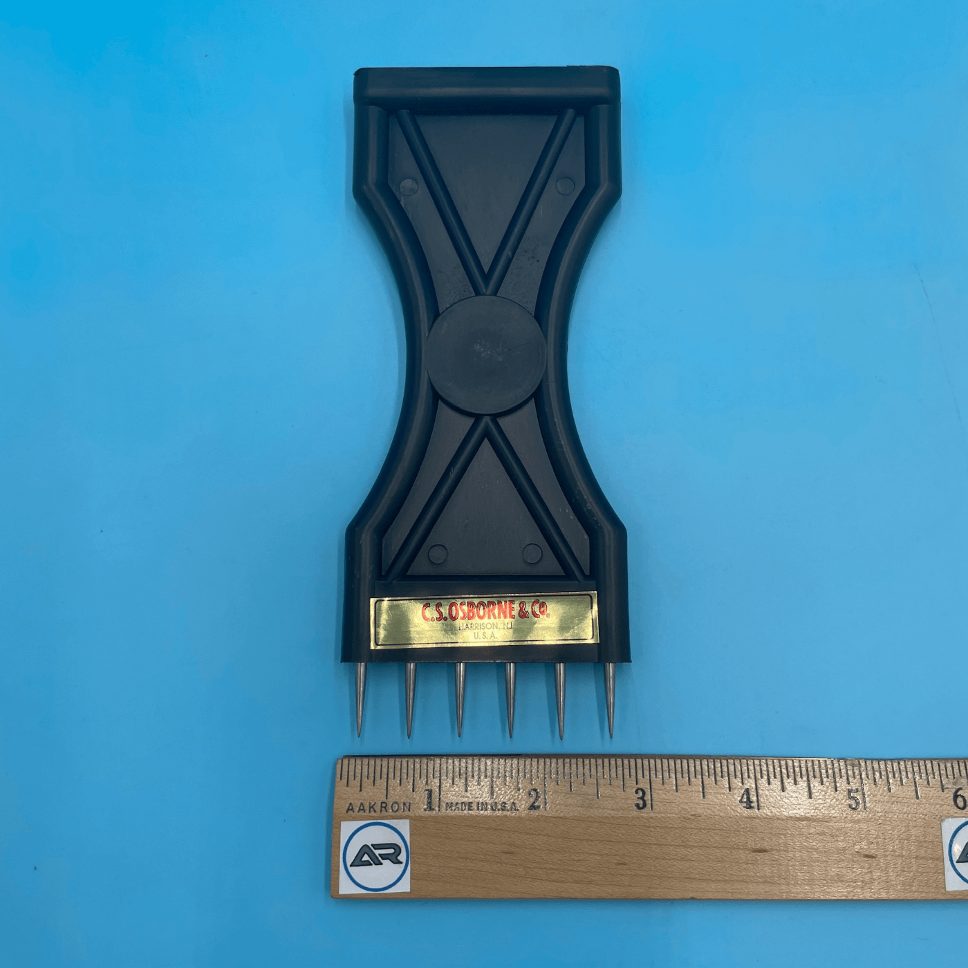 C.S. Osborne Plastic Webbing Stretcher (Groove End) 698P