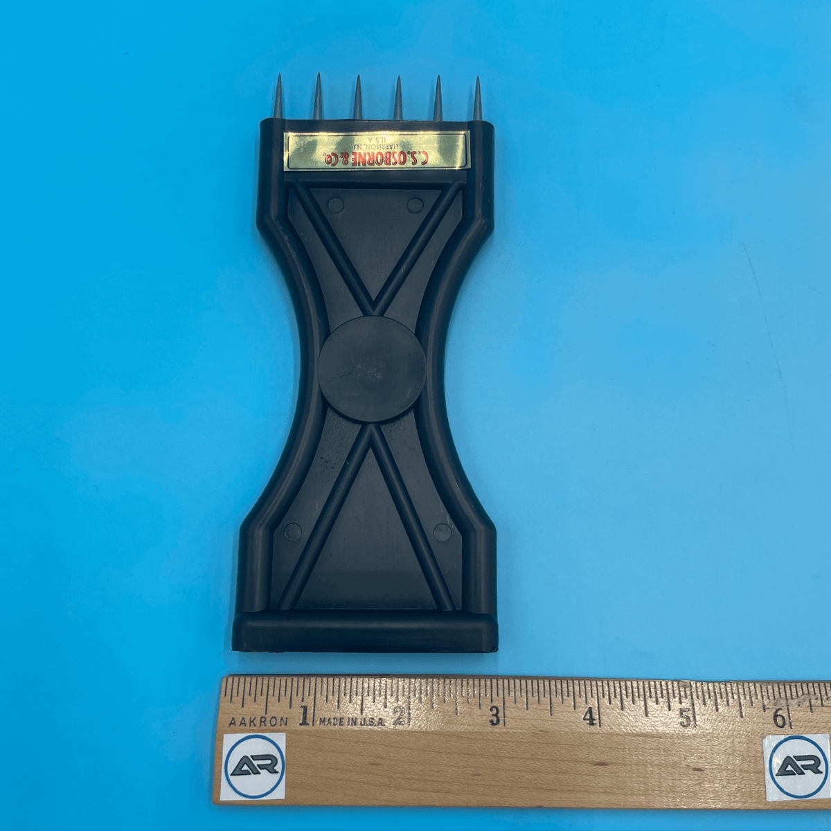 C.S. Osborne Plastic Webbing Stretcher (Groove End) 698 P